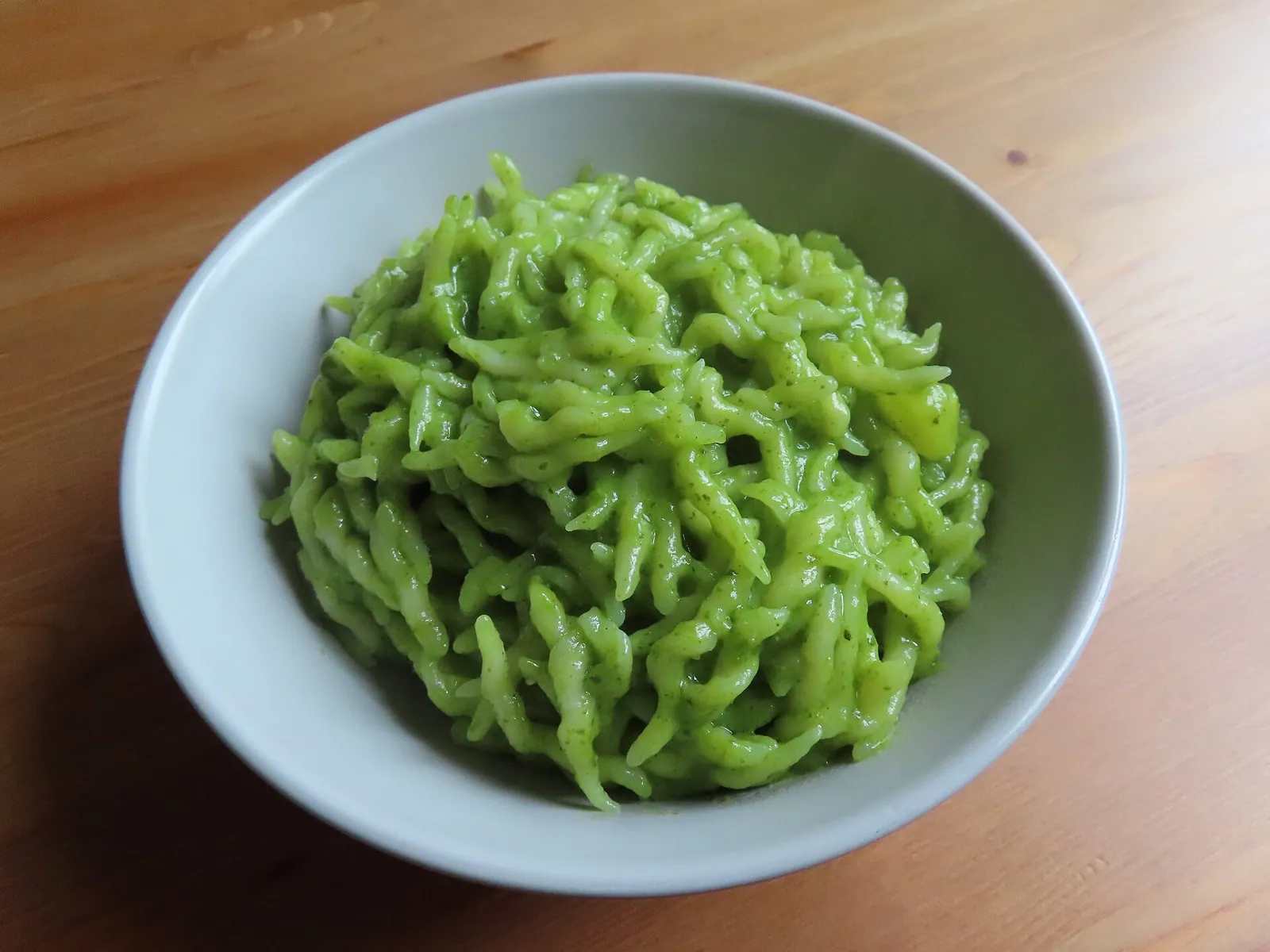 A plate of trofie al pesto genovese — the Ligurian dish celebrated by the Sagra delle Trofie in Sori.