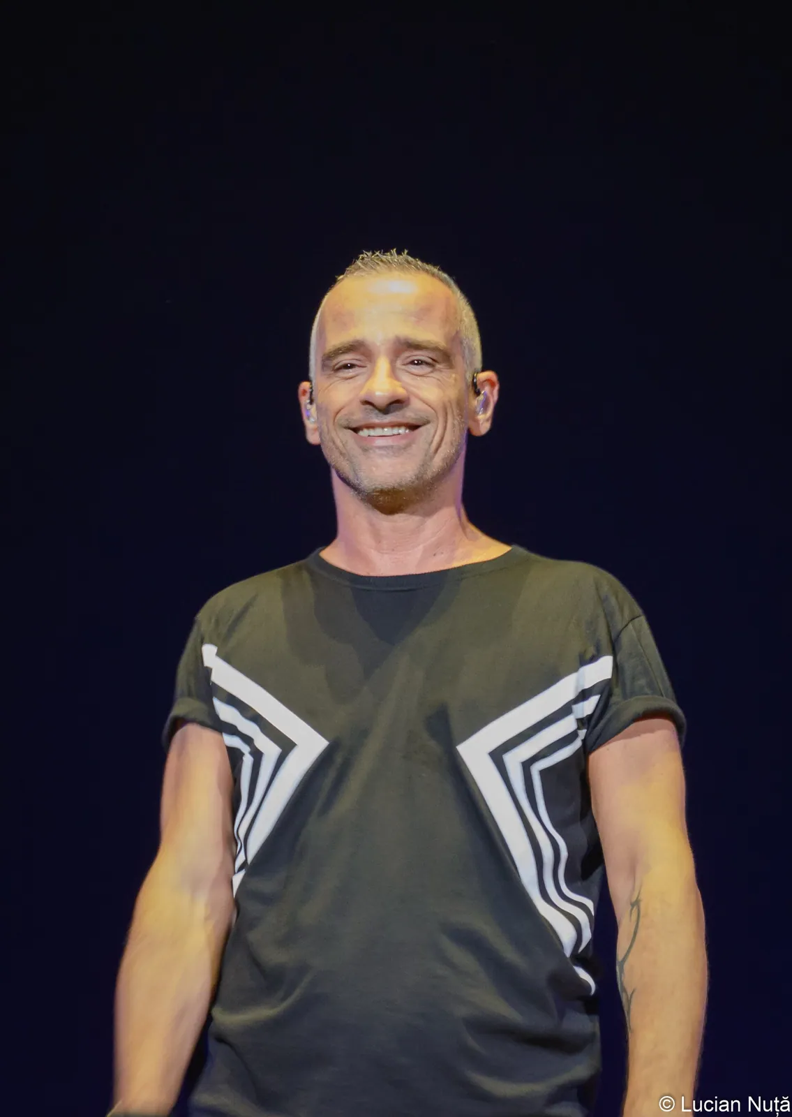 Eros Ramazzotti performing live on tour.